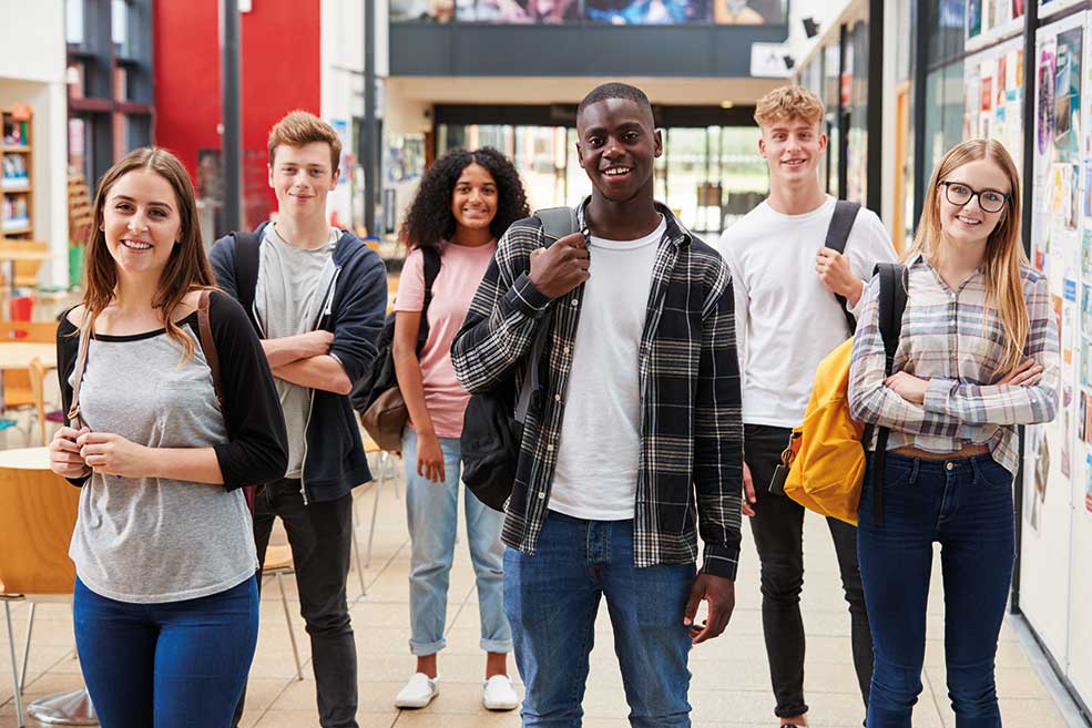 Group of young people in college setting