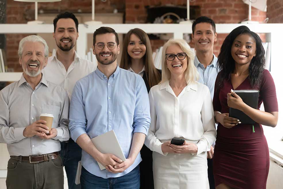 Group of work colleagues looking happy